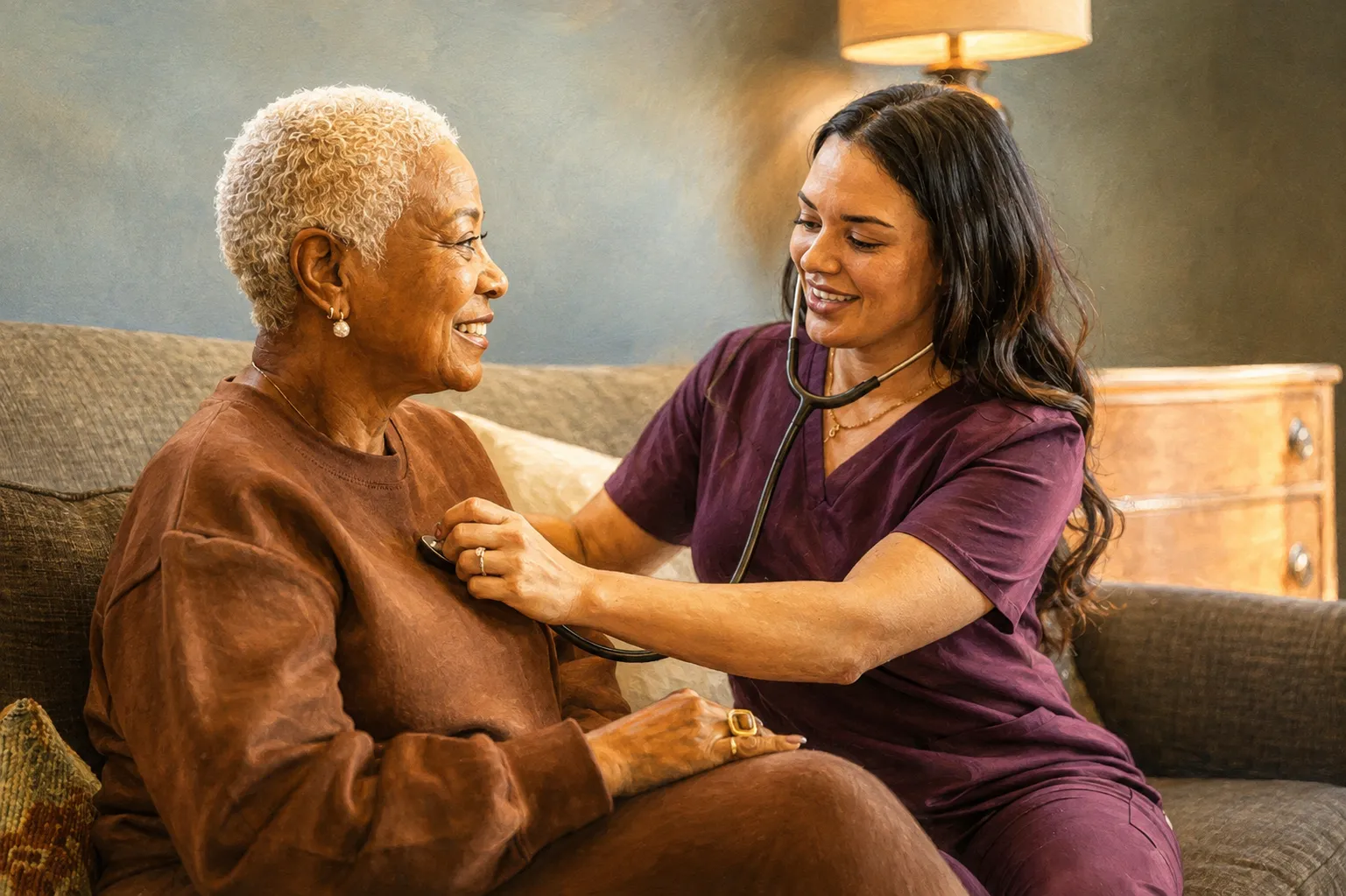 Caregiver checking an elderly client's heartbeat with a stethoscope